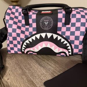 Stylish Pink and Black Checkered Sprayground Duffle Bag
